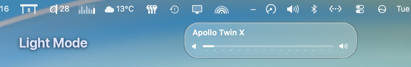 The system-style Volume HUD in Light mode - clear glass taking its colour from a light wallpaper