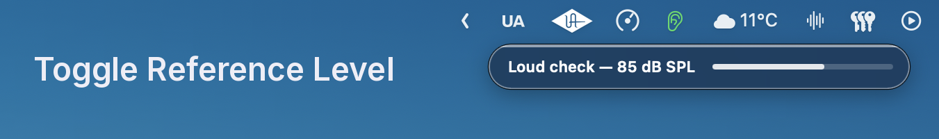 The labeled Volume HUD pill expanded to show the active Reference Level name and calibrated dB SPL value